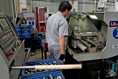 operating automatic lathe